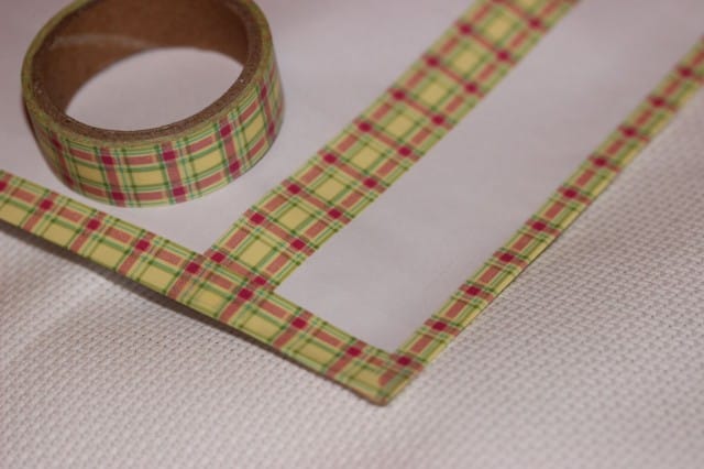 Kirjekuoren reunat ovat vahvistettu kuvioteipillä