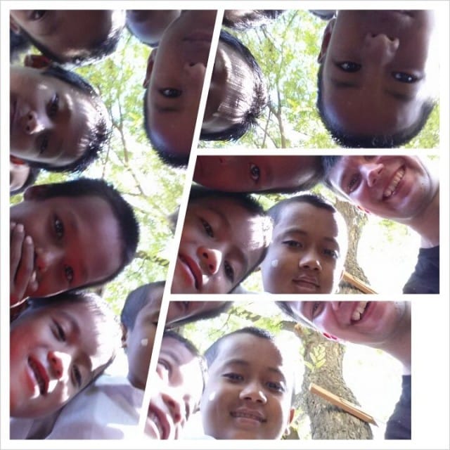 Burmalaisia lapsia ihmettelemässä länkkärin härveleitä.