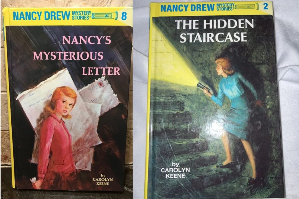 Nancy Drewn seikkailuja kirjoina. Kirjojen kansia joissa on nancyn kuva. Ovat myynnissä ebayssa. 