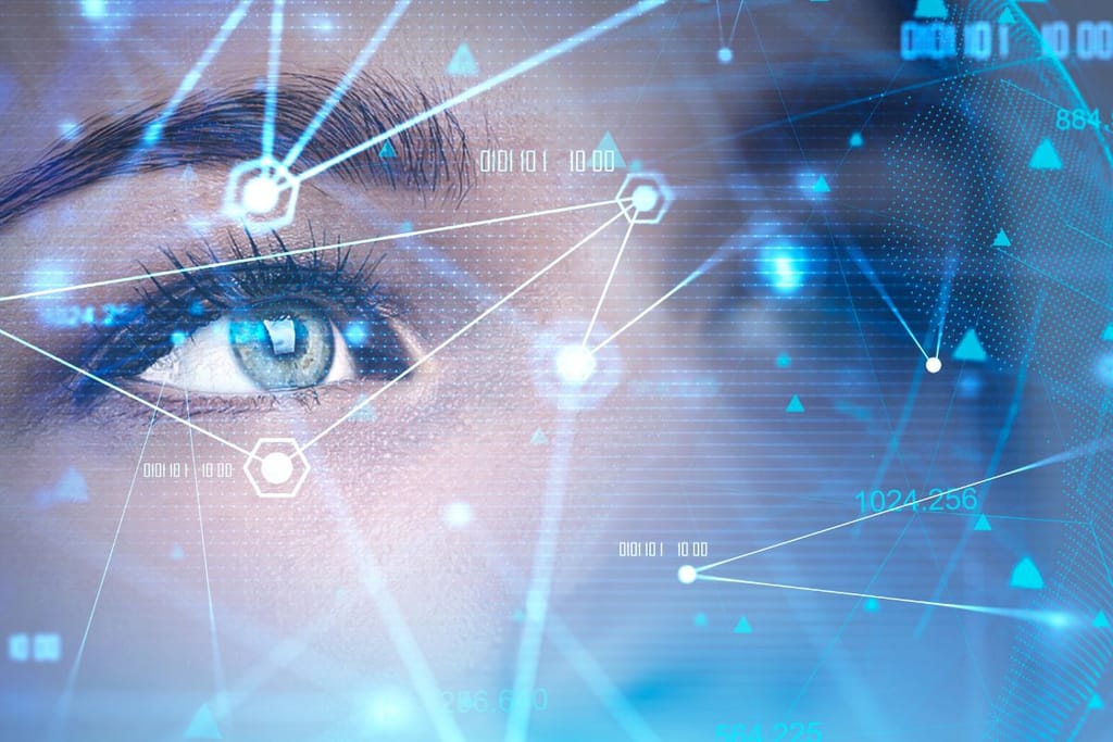 Kuvituskuva, joka kuvastaa tekoälyä kuvaannollisesti. Kuvassa on naisen silmät sekä erilaisia vipstaakeleita jotka näyttävät sähköisiltä. 