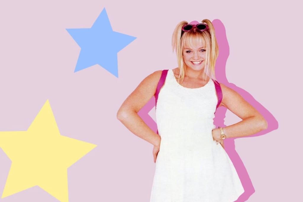 Vaaleahiuksinen nainen poseeraa hymyillen vaaleanpunaisella taustalla, taustalla värikkäitä tähtikuvioita ja hänen yllään on vaalea mekko.