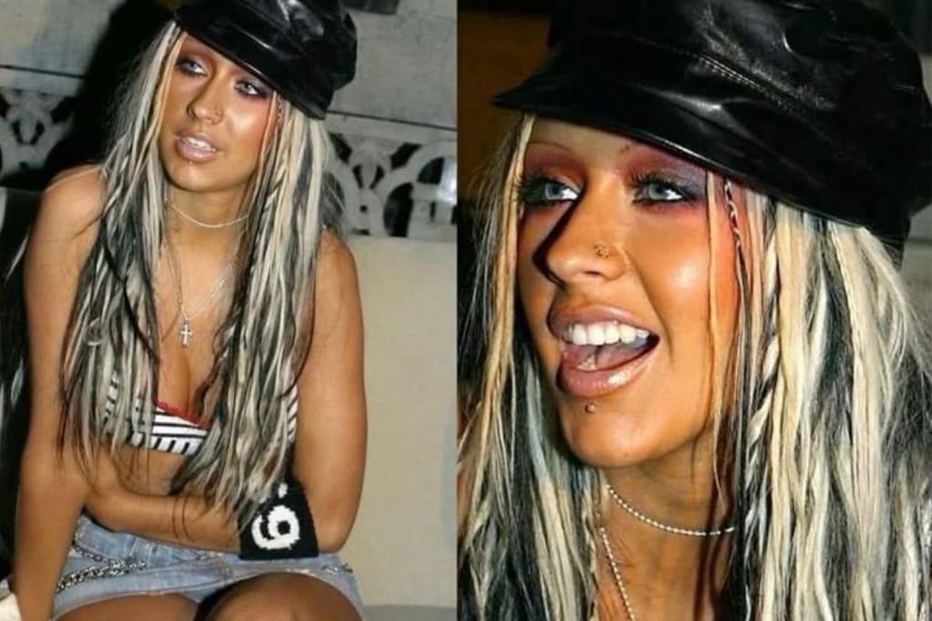 Kollaasi laulaja Christina Aguilerasta, joka on ehostettu ja puettu 2000-luvun alkupuolen muodin mukaisiin vaatteisiin ja meikkiin. Hänellä on ajan mukaiset vaatteet ja hattu sekä nollarimuodin mukaiset meikit ja tekorusketus.