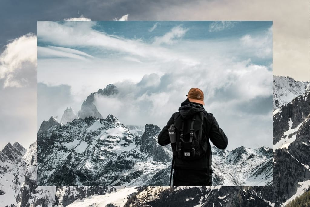 Yksin vaeltava henkilö lumisessa vuoristossa – alppiero-ilmiö kuvaa kumppanin jättämistä yksin luontoon