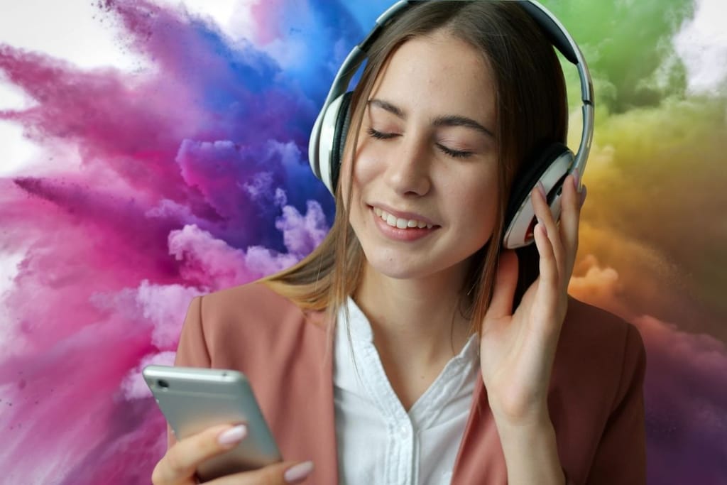 nainen kuuntelee musiikkia kuulokkeilla värikäs tausta synestesia aistit ristiin
