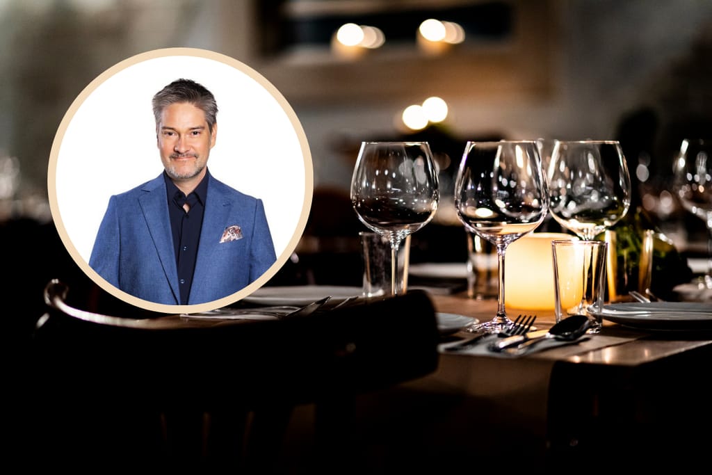 Taustalla kuva ravintolasalista, edessä huippukokki Henri Alén.