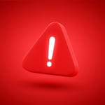 Punainen varoituskolmio huutomerkillä