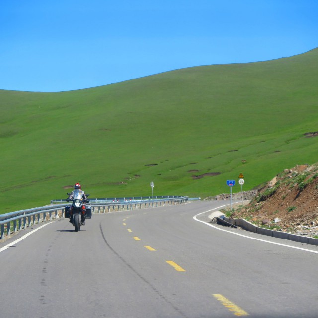 Riding motorbike from Narat to Buyinbulak in China Xingjiang